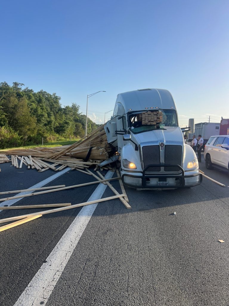 Lake Wales Truck Driver Cited After Lumber Shifts Through Cab on I-75